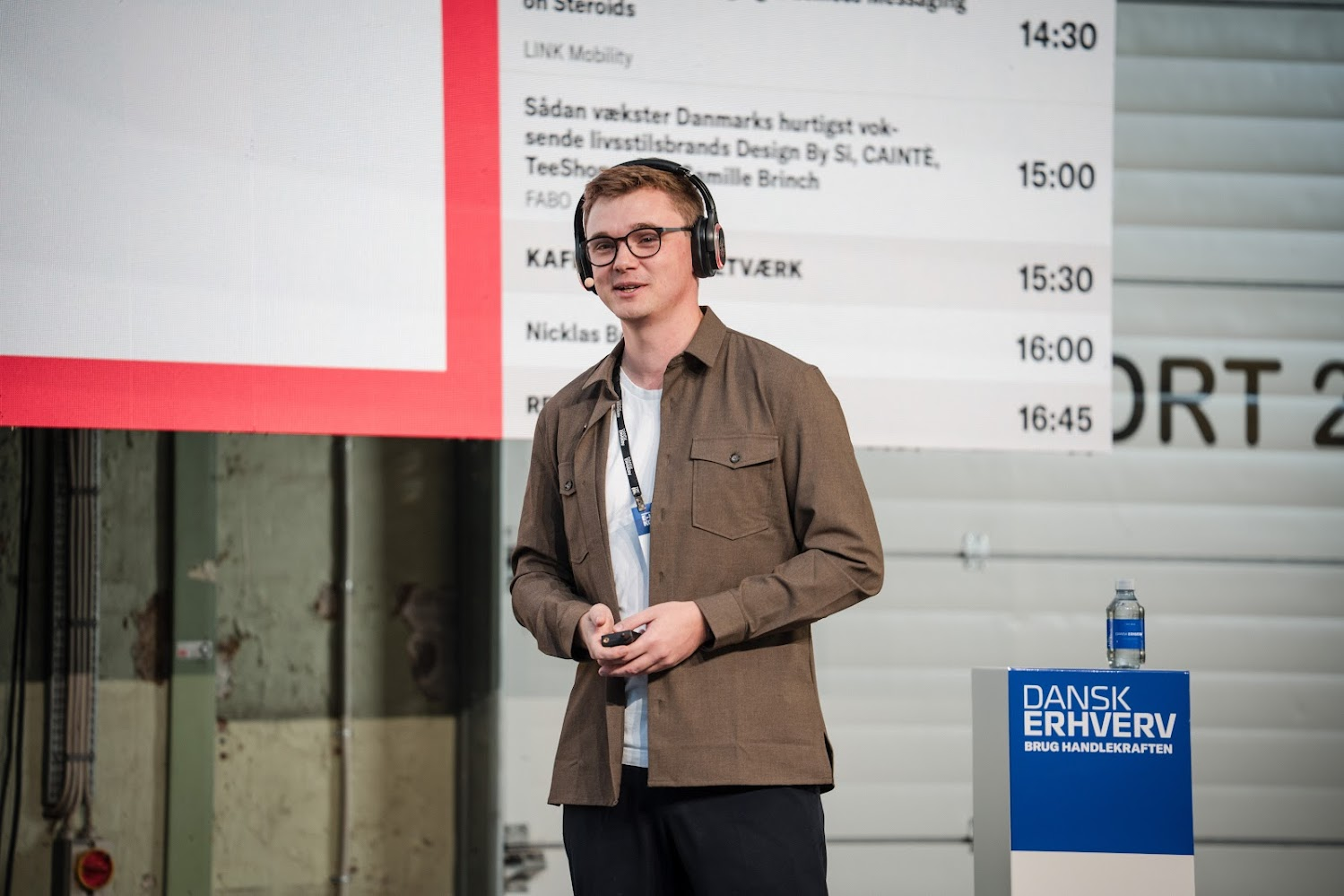Presenter speaking at a conference